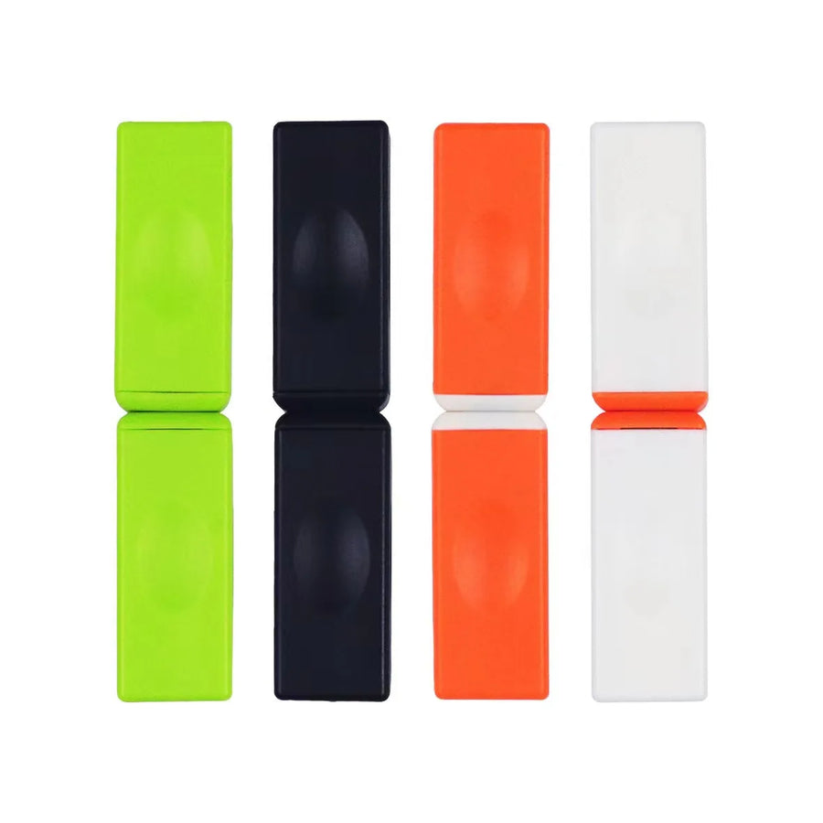 Colorful magnetic fidget blocks set on studio background for stress relief