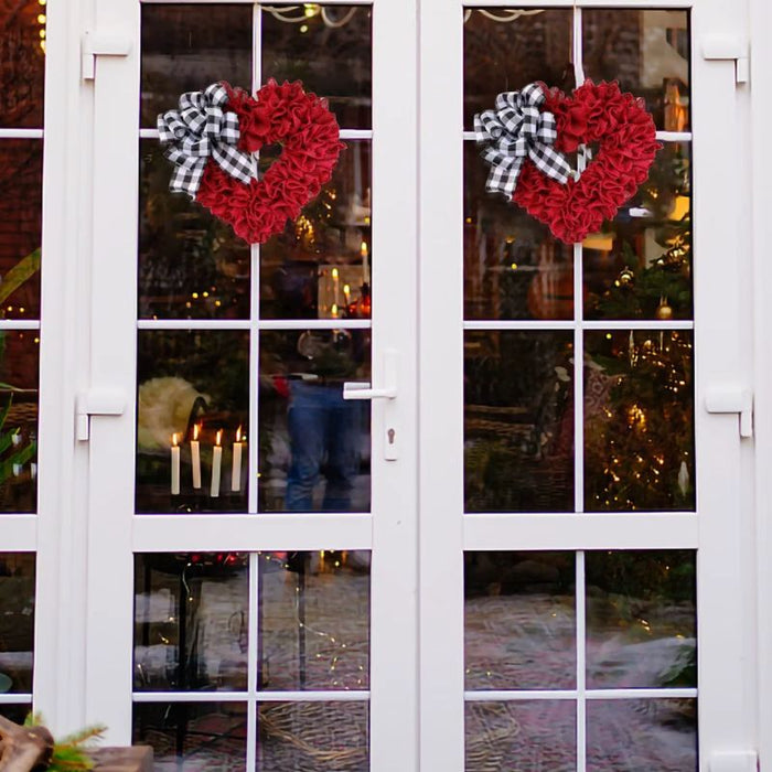 Festive heart-shaped wreath with holiday charm