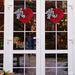 Festive heart-shaped wreath with holiday charm