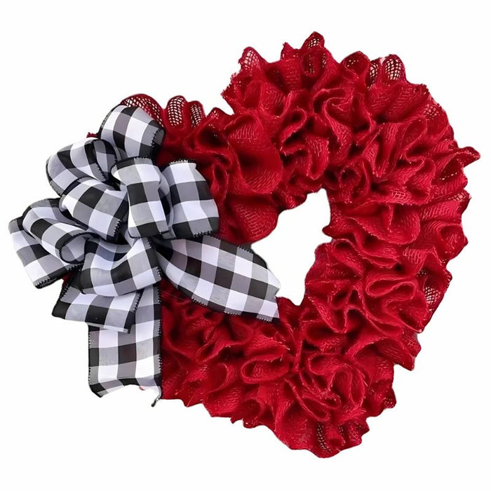 Festive heart-shaped wreath with holiday charm