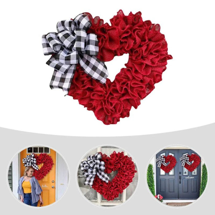 Heart-shaped wreath with plaid bow on front door